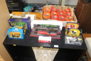 A quantity of diecast vehicles and trains