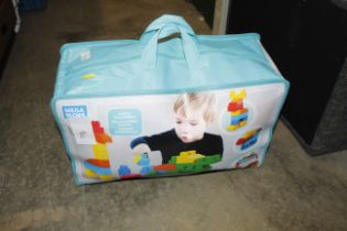 A quantity of children's Mega Bloks in carry bag