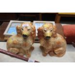 A pair of Staffordshire style dogs with glass eyes