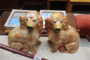 A pair of Staffordshire style dogs with glass eyes