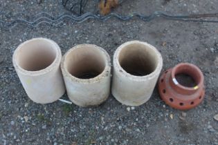 Three flue liner sections and a vented terracotta