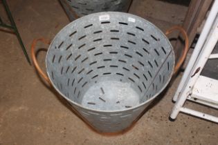 A metal twin handled oyster bucket (22)