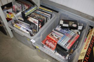 Two boxes of various DVDs, CDs etc.