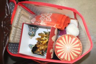 A box containing cloisonné bells; sheet music and