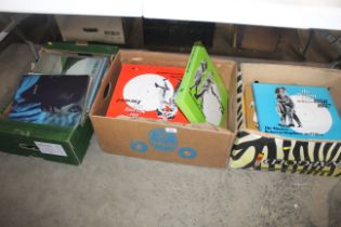 Three boxes of various records to include a run of