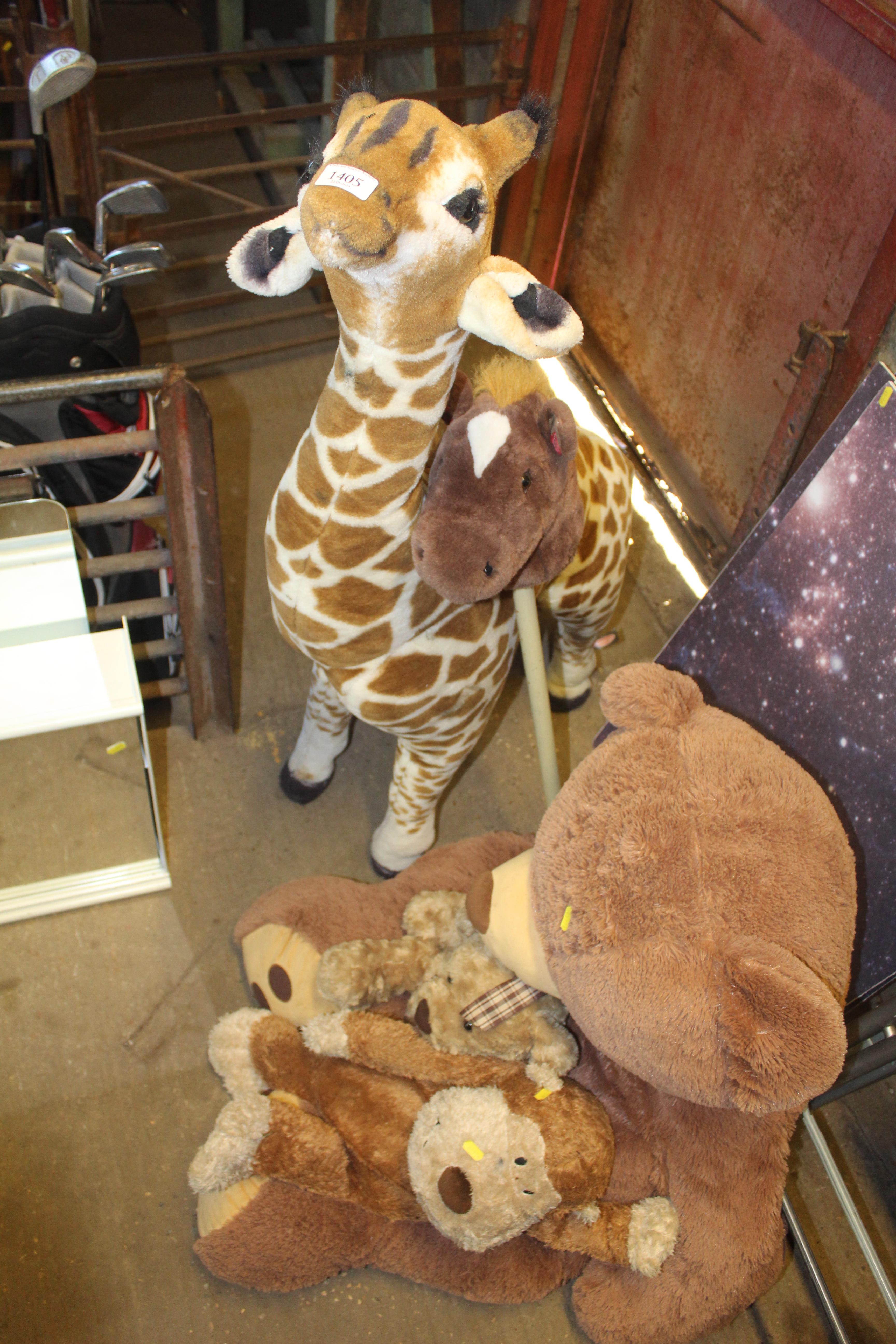 A quantity of soft toy animals to include giraffe,