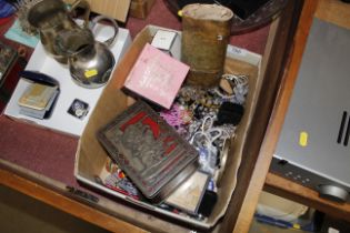 A box of various costume jewellery, a small bottle of Chanel No.5 eau de toilette etc.