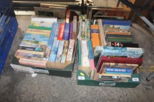 Two boxes of various paperback and hardback books