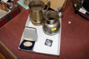 A silver plated tankard and pouring jug, a cased Q