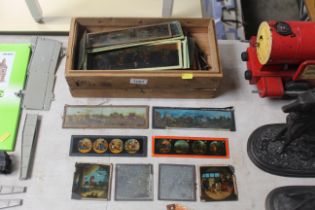 A box of various magic lantern slides