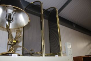 A four fold metal fire screen