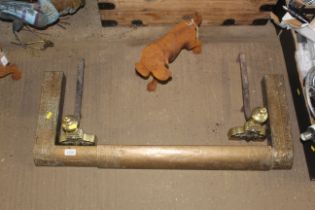 An expanding fire curb and pair of fire dogs with brass fronts