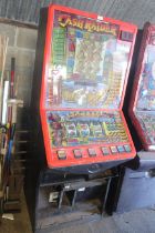 A Cashraider slot machine (Sold as a collectors it
