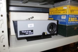 A Tokina RV-2000 video transfer unit with original