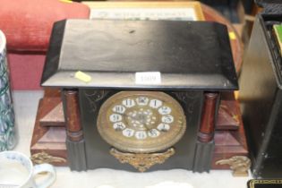 A marble effect cased two hole mantle clock with k