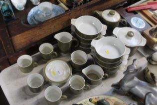 A quantity of Poole pottery, two tone teaware and