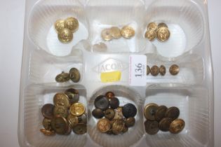 A collection of brass buttons mainly military rela