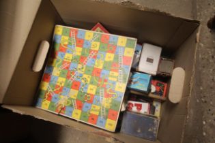 Two boxes containing various vintage games etc.