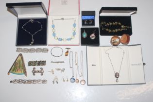 A box of various costume jewellery to include broo