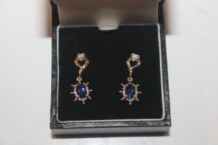 A pair of 9ct gold sapphire and diamond set ear-ri