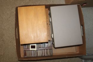 Three boxes and a tray of photograph slides to inc