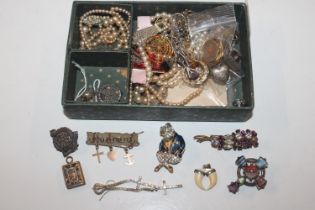 A box of various jewellery to include dress ring;