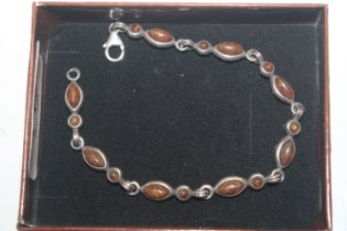 A 925 silver and amber set bracelet