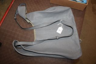 A grey leather Mulberry style handbag