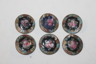 Six enamel decorated buttons