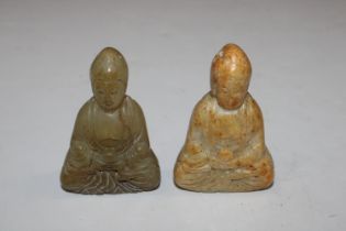 Two carved jade type Buddhas