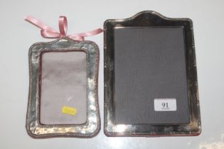 A silver photo frame and a silver plated photo fra
