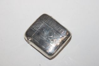 A large silver Vesta case with engraved foliate decoration, hallmarked Birmingham 1904, maker