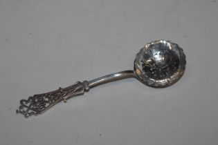 A silver sifter spoon with pierced handle, hallmar