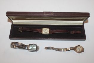 A Record 9ct gold cased wrist watch; a Bon and Per