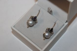 A pair of large sterling silver garnet and baroque