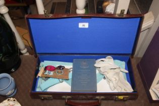 A Masonic case and contents of regalia