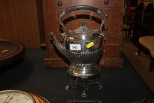 An early 20th Century silver plated tea kettle by