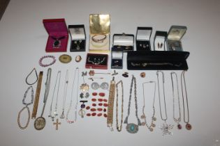 A box of various costume jewellery including neckl