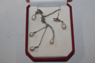 A sterling silver cultured pearl and cubic zirconi