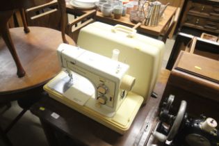 A Frister and Rossmann 404 sewing machine sold as