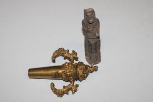 An Egyptian revival stone ornament and a gilt meta