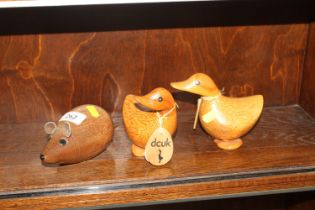 Two wooden ducks and a wooden mouse