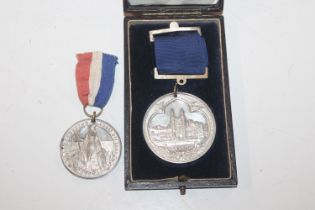 An Eton College medal for regular attendance and a