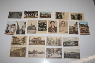 A box of assorted vintage post cards