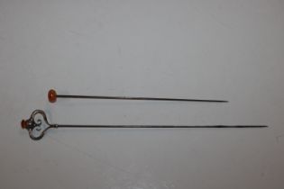 A Charles Horner hat pin and one other hat pin