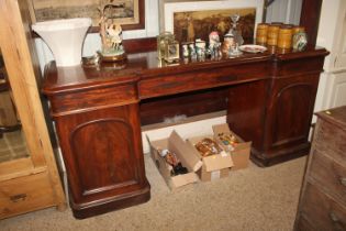 A Victorian mahogany twin pedestal sideboard fitte