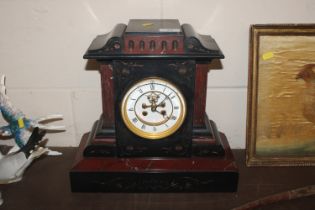 A late Victorian black slate and rouge marble two