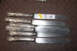 Six late Victorian silver handled table knives