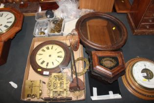 A quantity of various clock parts