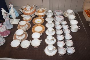 A collection of various patterned teaware to inclu